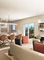Modern living room with dining area, dining table, chairs, couch, shelves, TV, decorative items, flowers