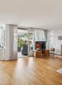 Wohnzimmer mit Balkon