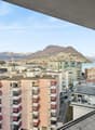 balcony with city and lake view, railings