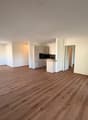 Wohnzimmer mit offener Küche