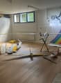 Wooden floor, aircrafts, boxes, cabinets, windows