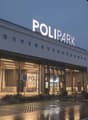 Polipark building, modern architecture, large windows, parking area, signboard, car parked
