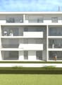 4-story modern apartment building with white exterior, large windows, and balconies on each floor