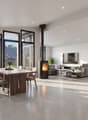 modern living room with fireplace, large windows, balcony, dining table, couch, TV