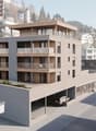 a new multistory building with a ground floor garage