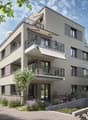 3 story building, balconies, plants, paved walkway, garden