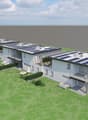 3 story apartment building, white exterior, solar panels on the roof, balconies, garden, outdoor seating