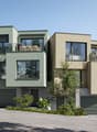 Two story house, green exterior, 3 garages, balconies