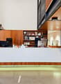 wooden desk, modern decor, office chairs, computer monitors, wooden cabinets, bookshelves, decorative items