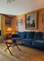 Séjour avec cheminée / Living room with fireplace / Soggiorno con camino