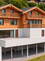 Vue sur les 2 chalets mitoyens (Photomontage) / View of the two adjoining cottages (photomontage) / Vista dei due chalet adiacenti (fotomontaggio)