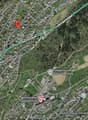 Aerial map of a town with roads, buildings, and landmarks