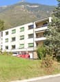 3 story building, balcony, view of the mountains
