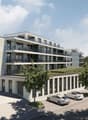 5 story residential building, balconies on multiple floors, green roofs, large windows, multiple parking areas