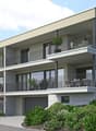 3 story house, modern design, balconies, raised ground floor, garage