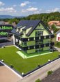 House. Aerial view of a modern house with solar panels, green lawn, and surrounding houses.