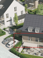 Aerial view of a residential area with multiple houses, parking spaces, and outdoor seating areas.
