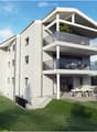 Modern two-story house with white exterior, multiple balconies, and outdoor patio furniture.