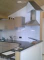 {"type": "Kitchen", "objects": ["sink", "faucet", "cabinets", "countertop", "range hood", "faucet", "bottle", "cup", "faucet", "bottle", "cup", "bottle", "bottle", "bottle", "bottle", "bottle", "bottle", "bottle", "bottle", "bottle", "bottle", "bottle", "