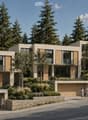 Modern two-story house with large windows, wooden shutters, and a spacious driveway with two garages.