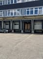 Warehouse with multiple loading docks and an exterior parking lot