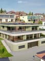 Raised ground floor house with solar panels on the roof, garage, balconies, multiple windows