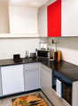 {"type": "Kitchen", "objects": ["sink", "faucet", "microwave", "oven", "toaster", "cupboard", "fridge", "oven mitt", "oven", "oven mitt", "oven", "oven", "oven", "oven", "oven", "oven", "oven", "oven", "oven", "oven", "oven", "oven", "oven", "oven", "oven