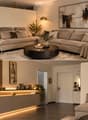 Modern living room with a large sectional sofa, coffee table, floor lamp, and decorative items including vases and picture frames. The space features warm lighting and a sleek design.