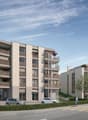 Multi-story residential building with balconies, modern architecture, surrounded by greenery