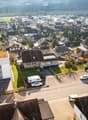 residential area, several houses, driveways, parking, aerial view
