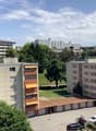 Large apartment complex with a parking lot