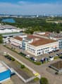 Multi-building industrial estate with parking lot and road network