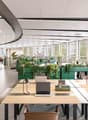 desks with laptop, office chair, pendant light, shelf with plants