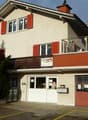 2 story house, red shutters, balcony, garage, parking place