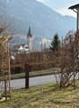 fence, grass, trees, road, mountain, tower, buildings