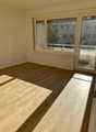 Wohnzimmer mit Balkon