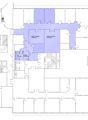 Commercial building floor plan with common areas, meeting rooms, and shared facilities.