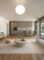 Open plan living room with kitchen, large windows, balcony, hardwood floor, modern furniture, plants