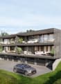 3-story modern apartment building with balconies, large windows, and a parking area in front