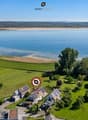 Seltene Seeliegenschaft mit parkähnlicher Gartenlandschaft.