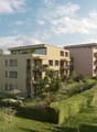 Multi-story apartment building with balconies, surrounded by a well-maintained garden with trees and landscaping.
