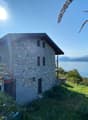 2 story stone house with lake view, balcony, small garden