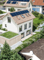 2 story house, tiled roof, solar panels, raised ground floor, terrace, green roof, swimming pool
