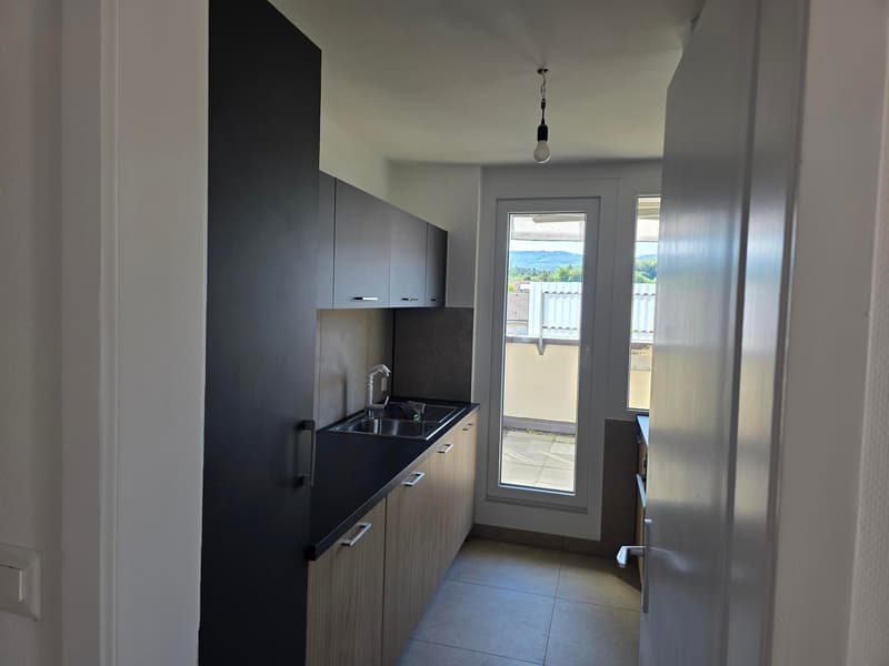 Charmant appartement en attique de 4.5 pièces à Porrentruy avec véranda (18)