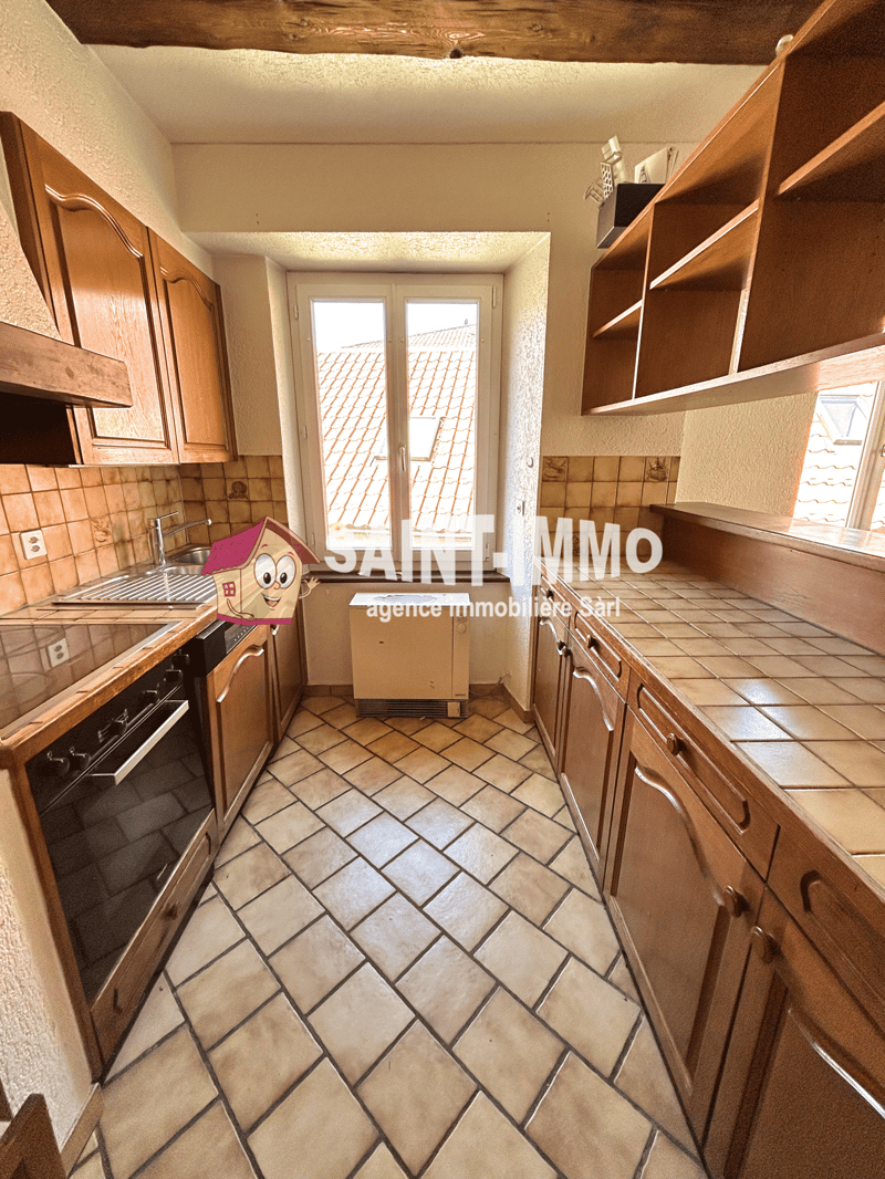 Immeuble locatif à réhabiliter de 4 appartements, un local, une parcelle constructible et un garage (12)