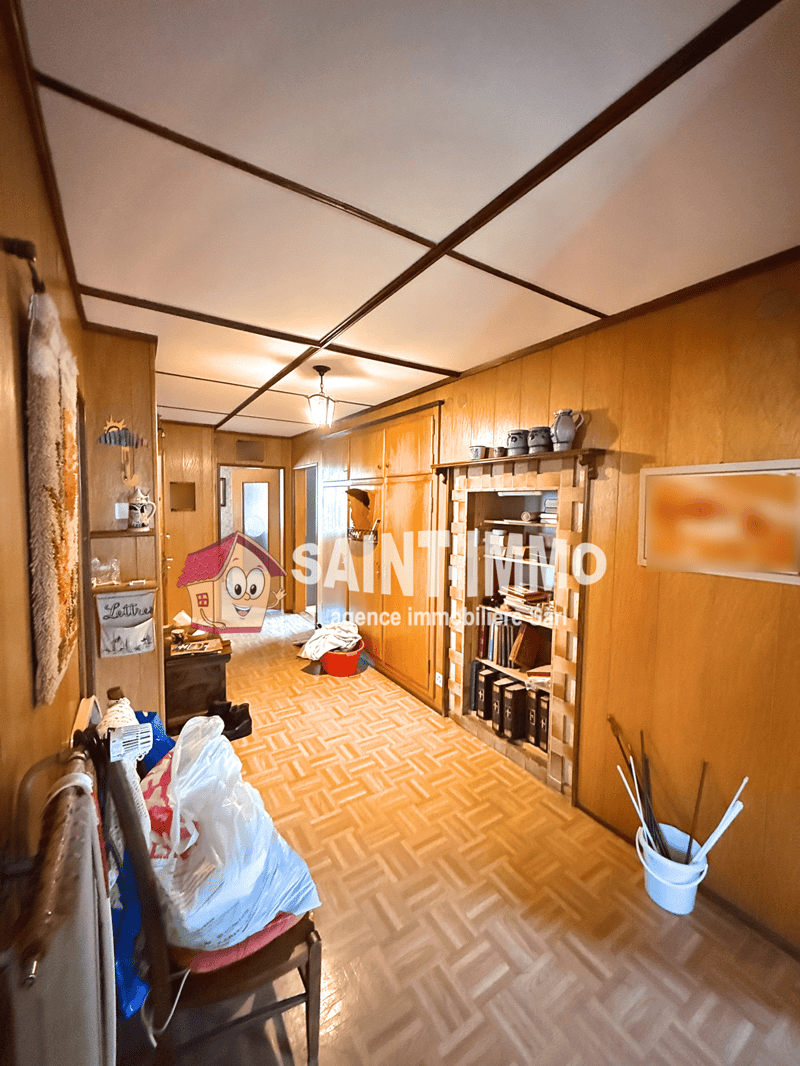 Chalet de deux appartements (3 & 6.5 pièces) avec jardin arboré de 840 m2, terrasse et garages (12)