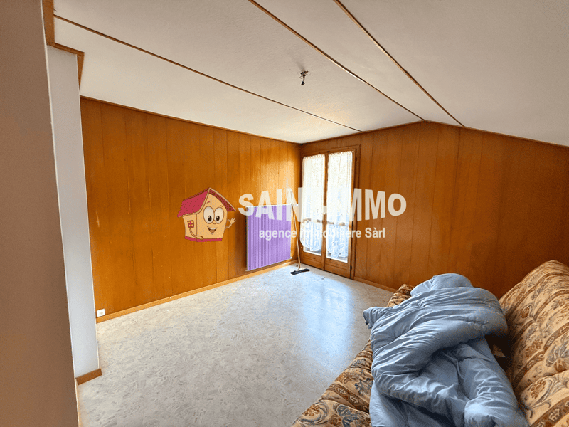 Chalet de deux appartements (3 & 6.5 pièces) avec jardin arboré de 840 m2, terrasse et garages (19)