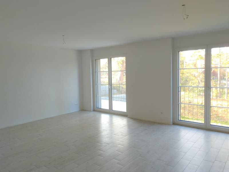 Moderne 3.5 Zimmer-Wohnung mit grossem Sitzplatz und Blick ins Grüne (3)