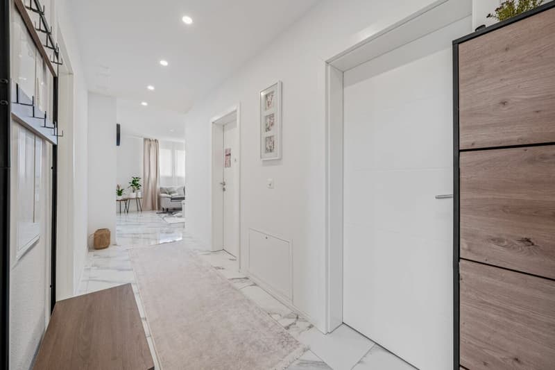 Casa familiare completamente ristrutturata con un potenziale di rendita attraente (3)