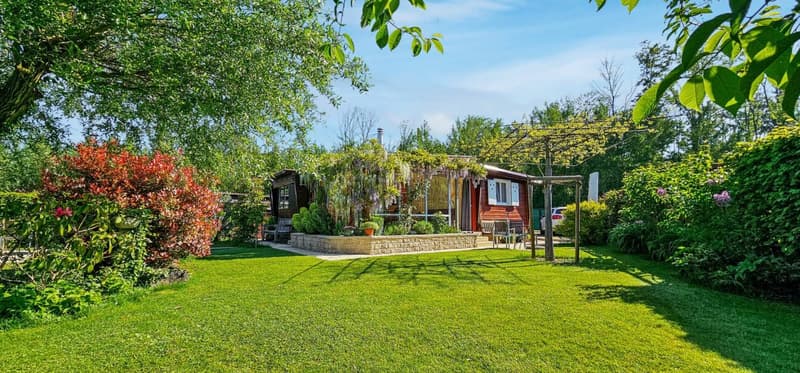 Well-maintained mobile home with 549 m² of land, a total of 5 plots with great development potential (1)